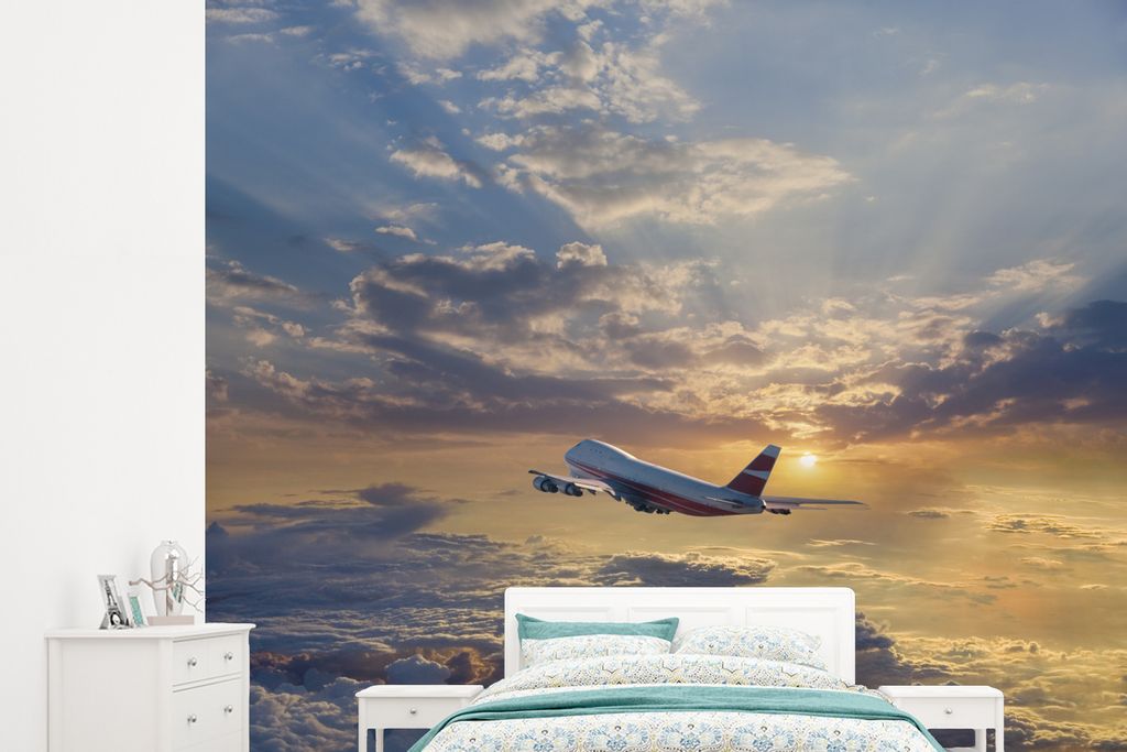 MuchoWow Fototapete für Wohnzimmer oder Schlafzimmer Wandtapete Vinyl Motivtapete Ein Flugzeug fliegt durch den Himmel mit Sonnenstrahlen - 245x...