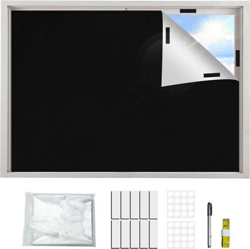 A black blackout roller blind is shown installed on a window, with a corner peeled back to reveal the sky. Below the window, the accessories for installation are laid out: a bag of what appears to be the blind material, velcro strips, circular adhesive pad
