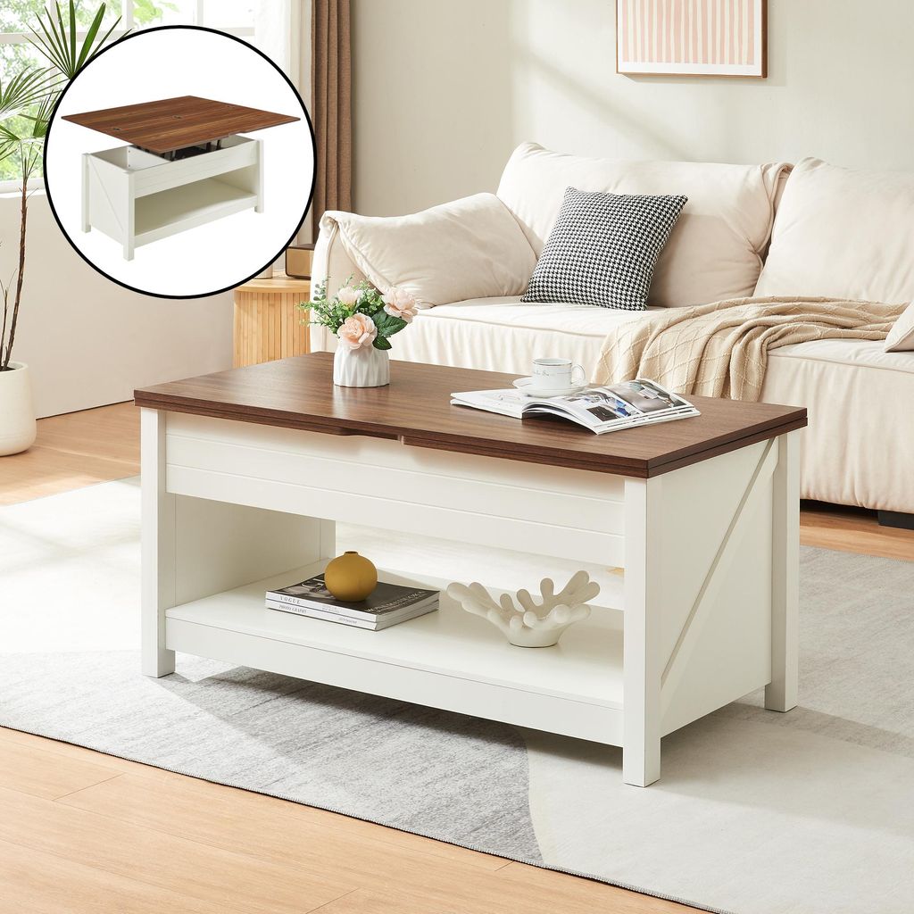 A living room scene with a coffee table in the foreground and a sofa in the background.