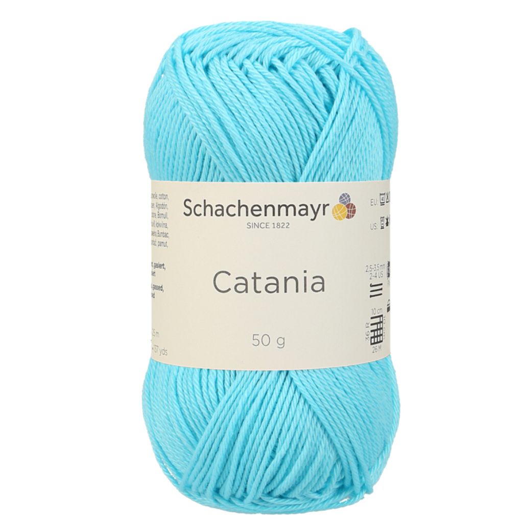A ball of turquoise yarn with a label.
