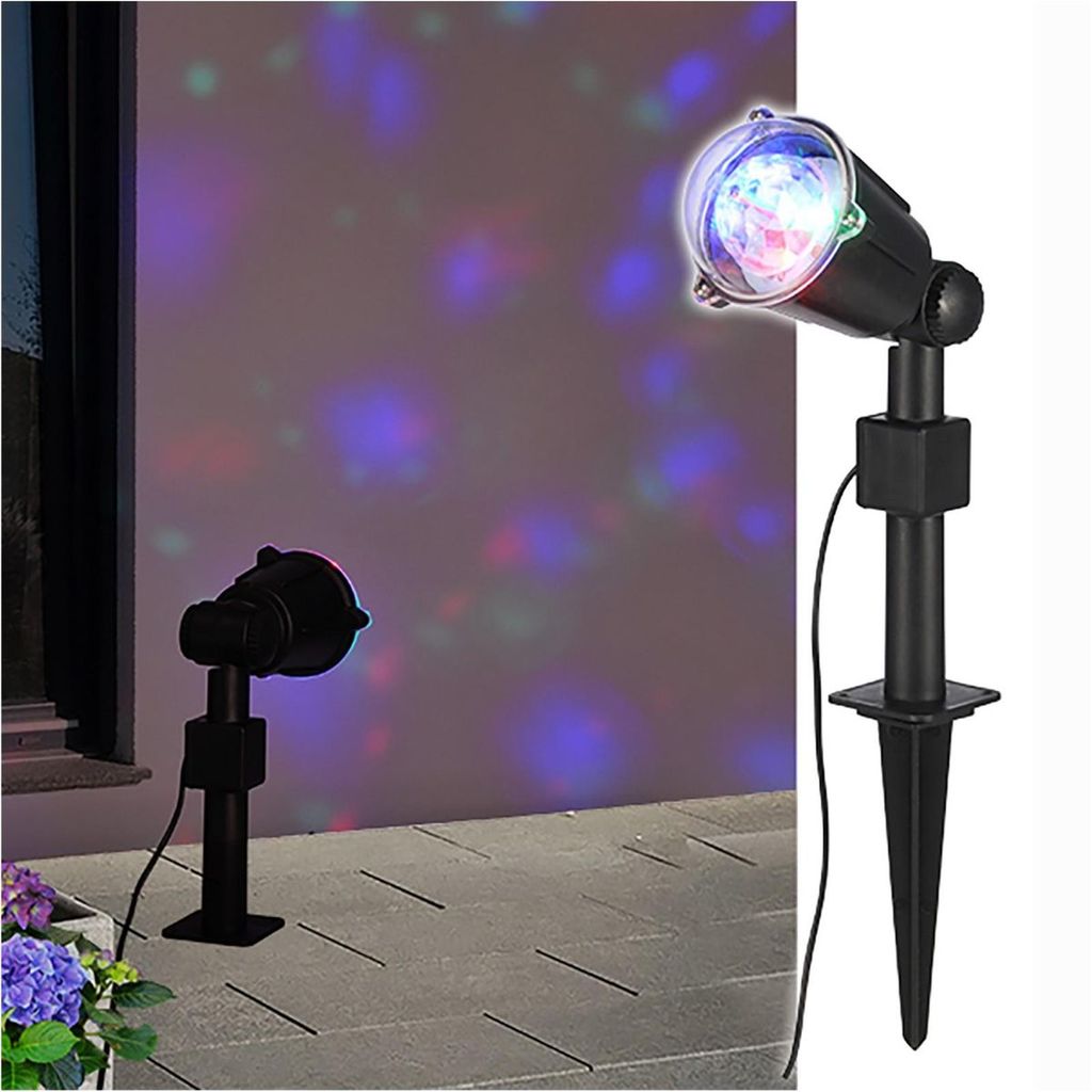 Two LED party lights projecting colorful dots onto a wall and patio.