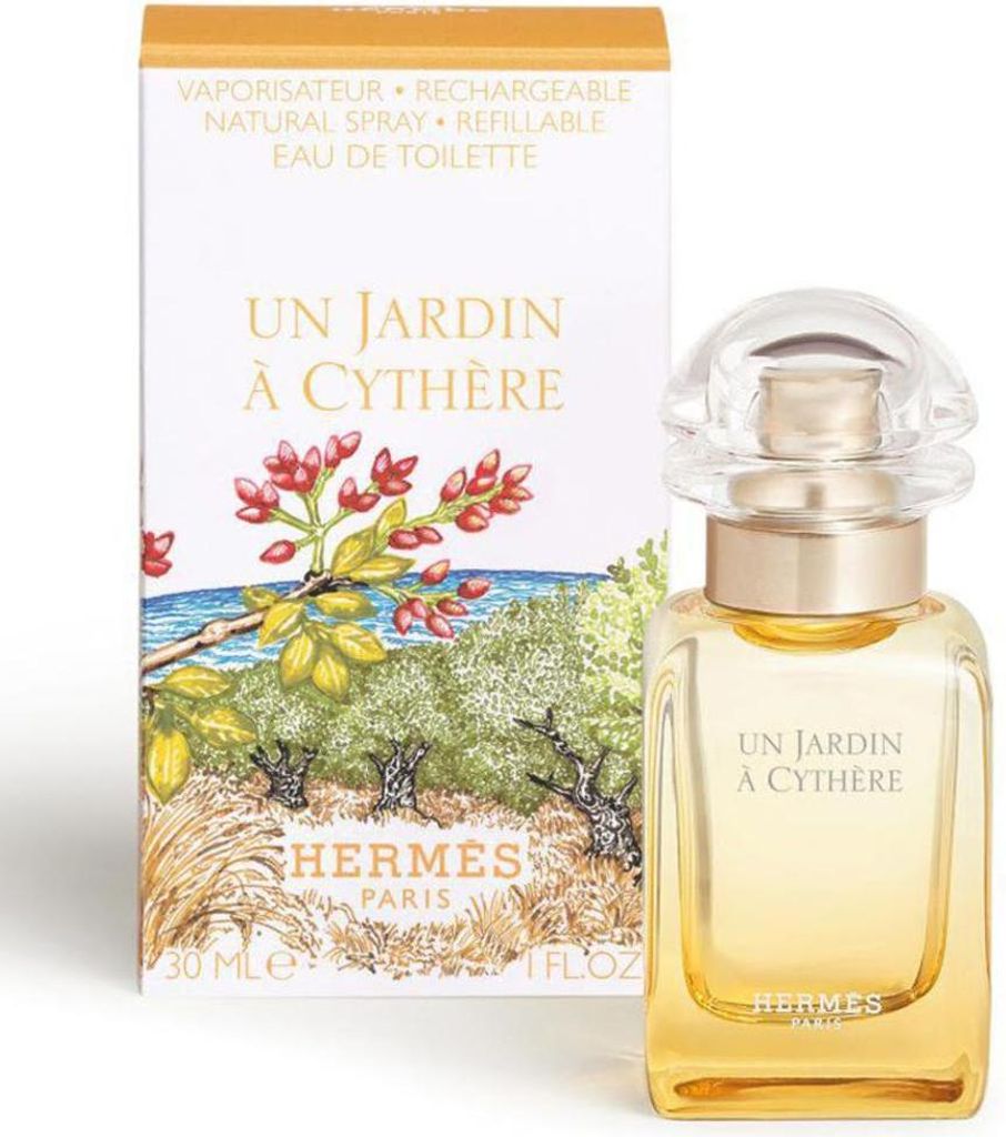 A perfume bottle and its packaging are displayed side-by-side against a white background.