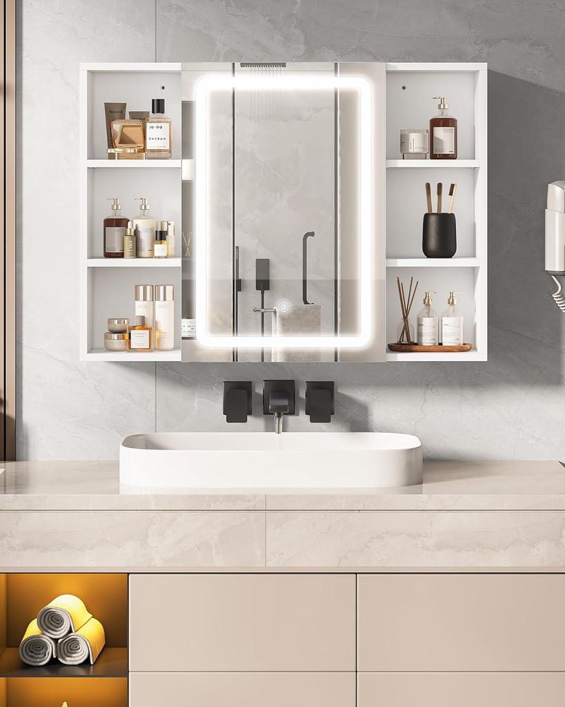 A white bathroom cabinet with a mirror and LED lighting above a sink.