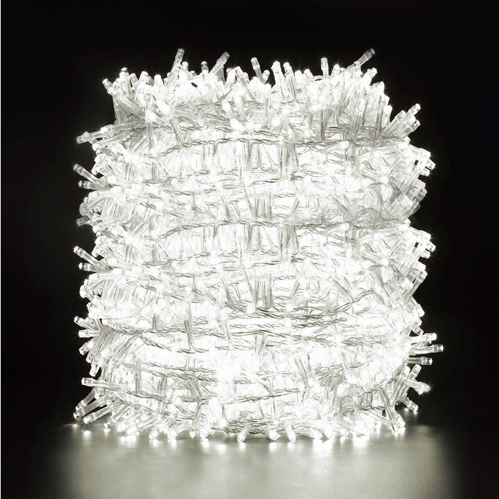 A tightly wound coil of white LED string lights against a black background.