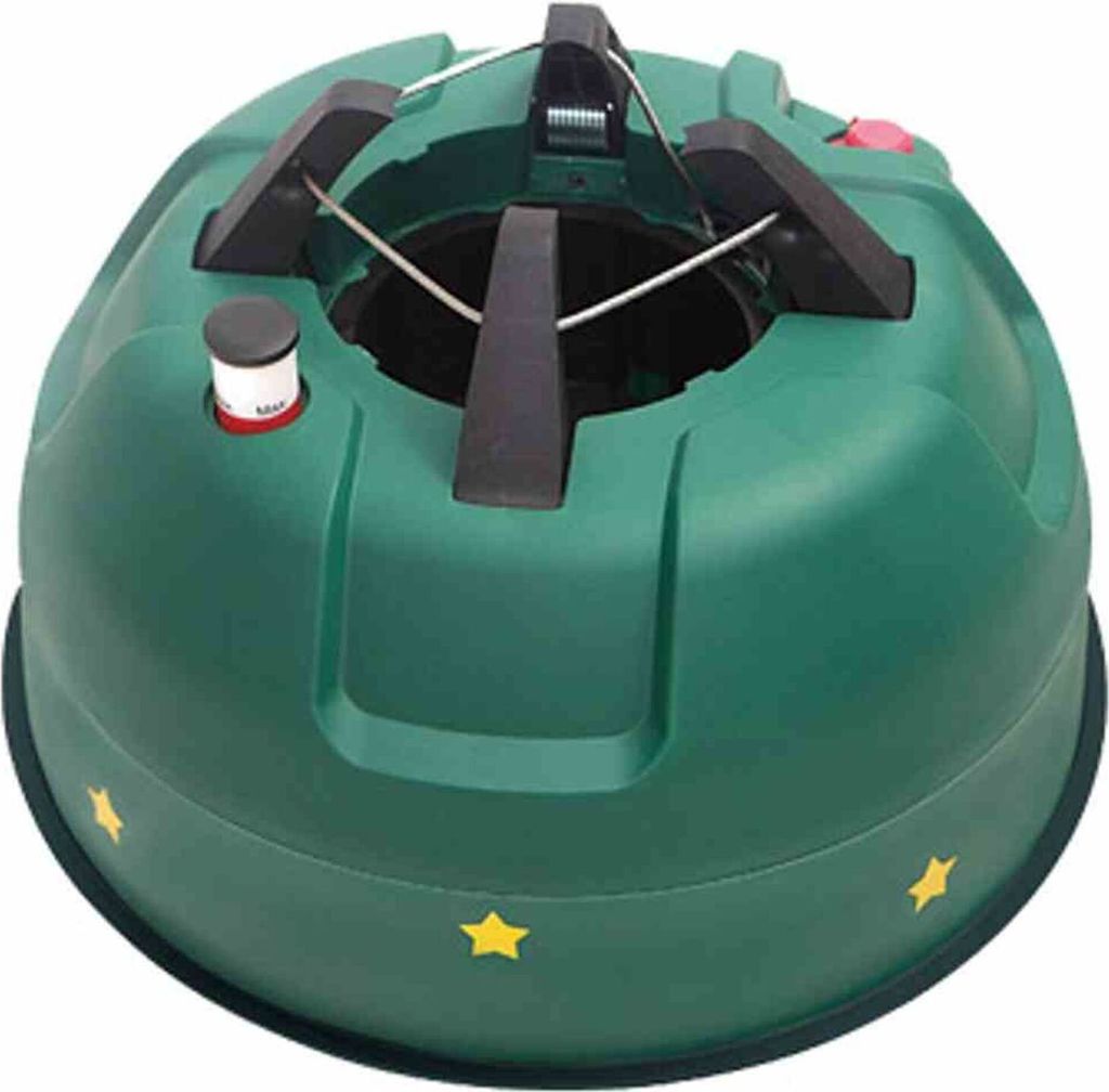 A green Christmas tree stand with yellow stars on the base.
