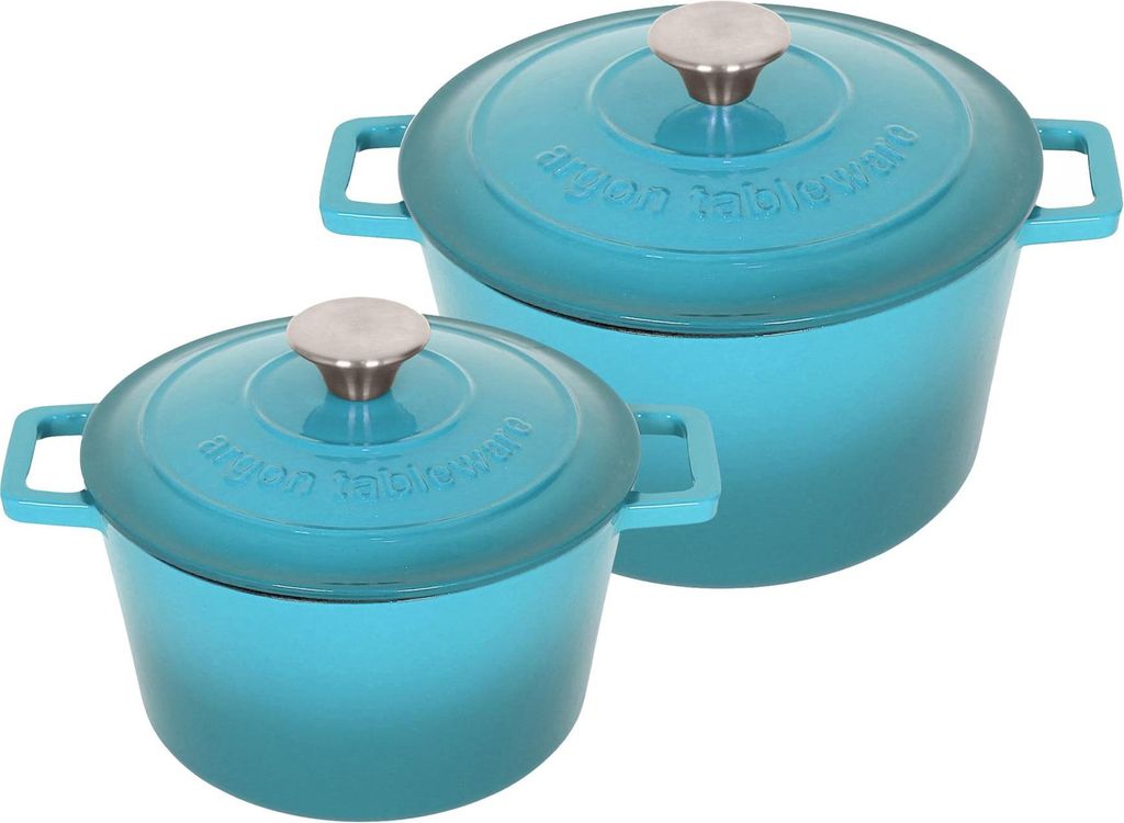 Two turquoise cast iron Dutch ovens of different sizes are shown against a white background.