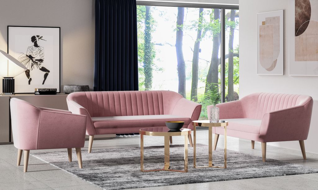 A living room scene with pink velvet furniture and a large window overlooking a forest.
