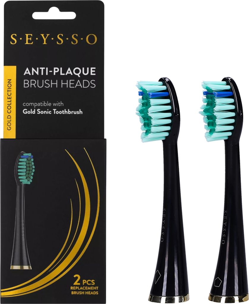 A product shot of two replacement brush heads for an electric toothbrush, along with their packaging.