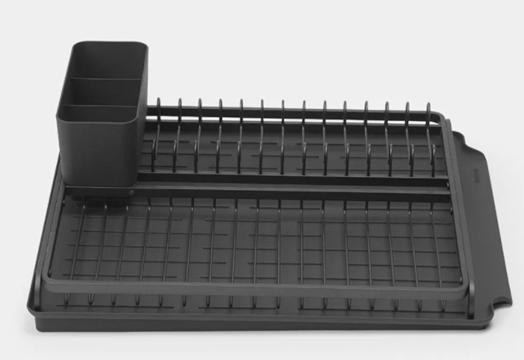 A dark gray dish drying rack with an attached utensil holder, shown against a plain light gray background.