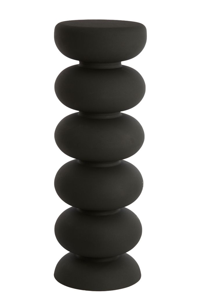A black decorative pillar or column.