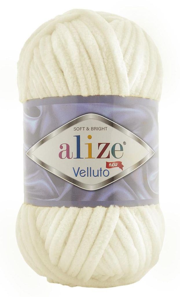 A ball of cream-colored yarn with a label.