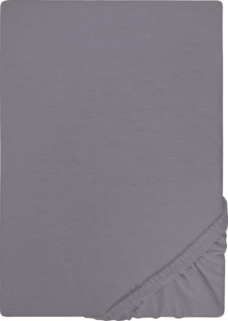 A flat lay of a grey fitted sheet, with the elasticized corner visible in the bottom right.