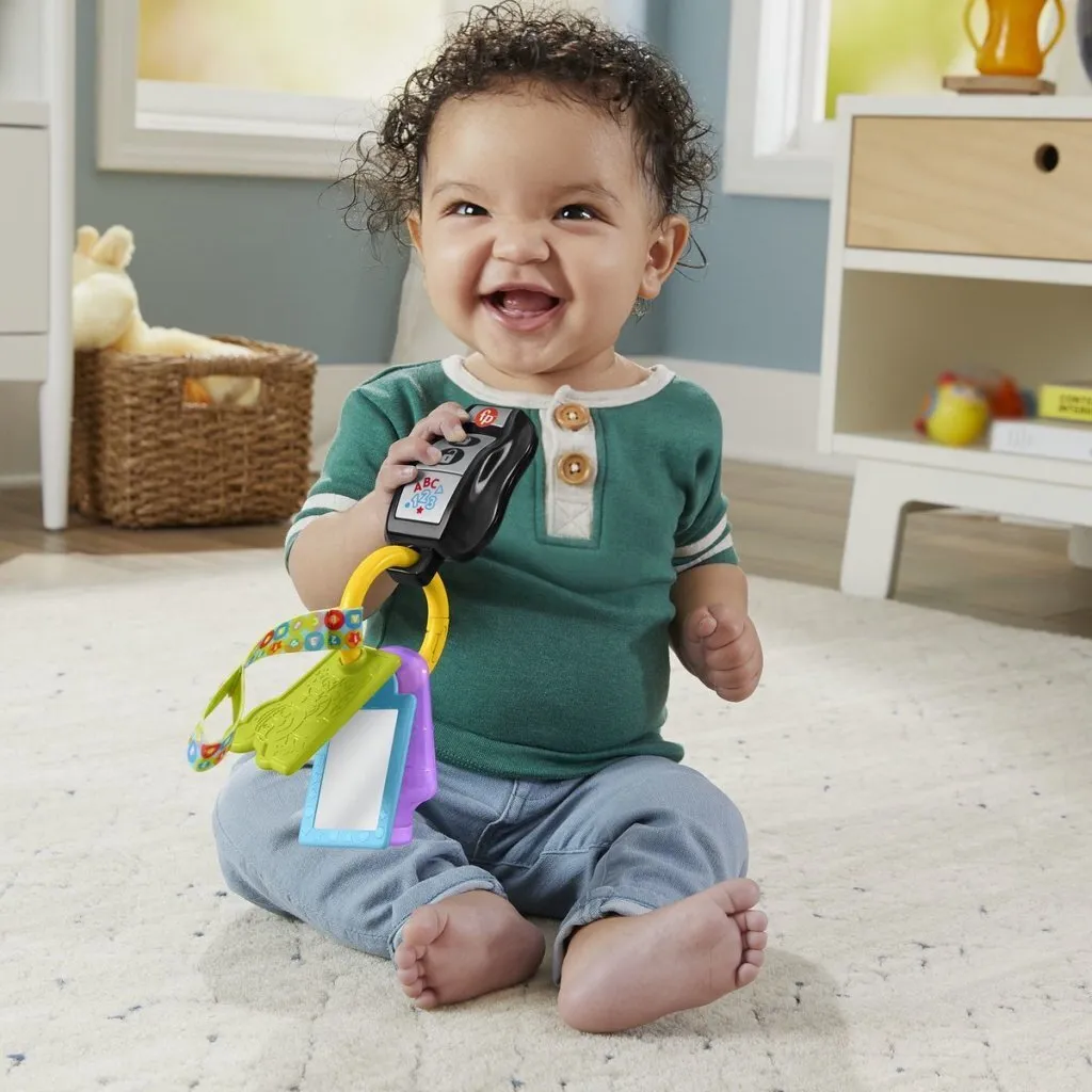Porte-clés Interactif Multilingue avec Miroir et Anneau de Dentition