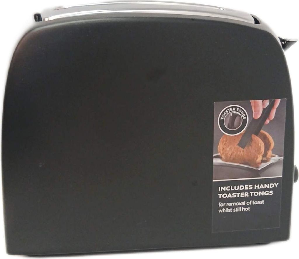 A close-up of a black toaster with a marketing sticker showing how to use the included tongs.