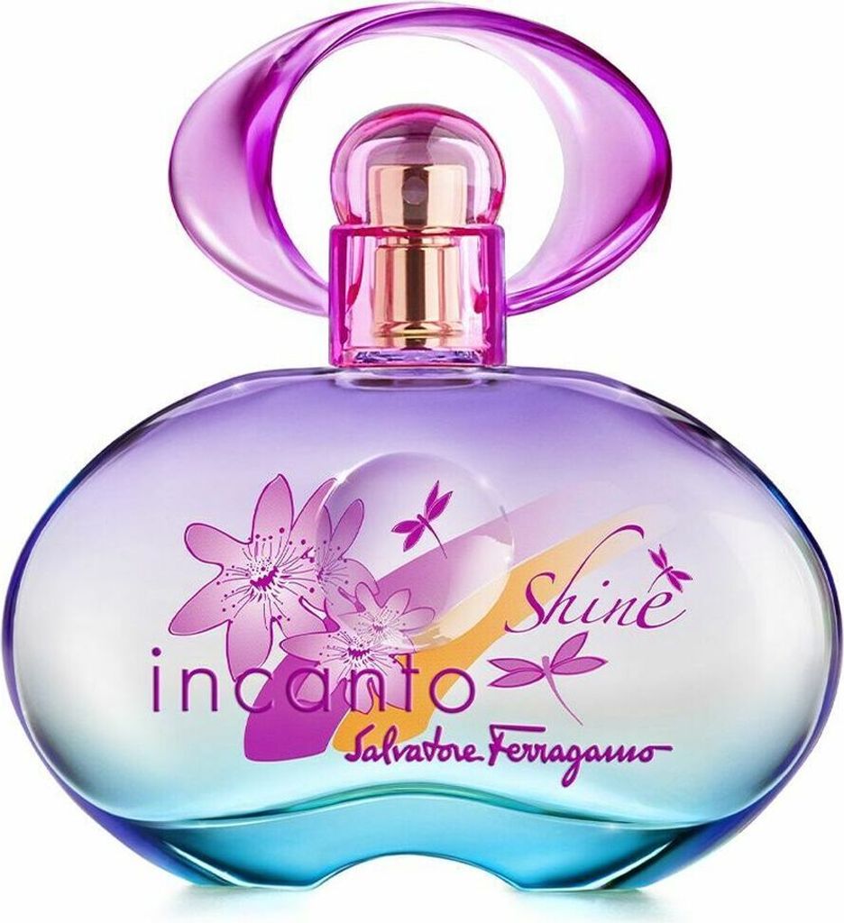 A perfume bottle with floral and dragonfly designs.