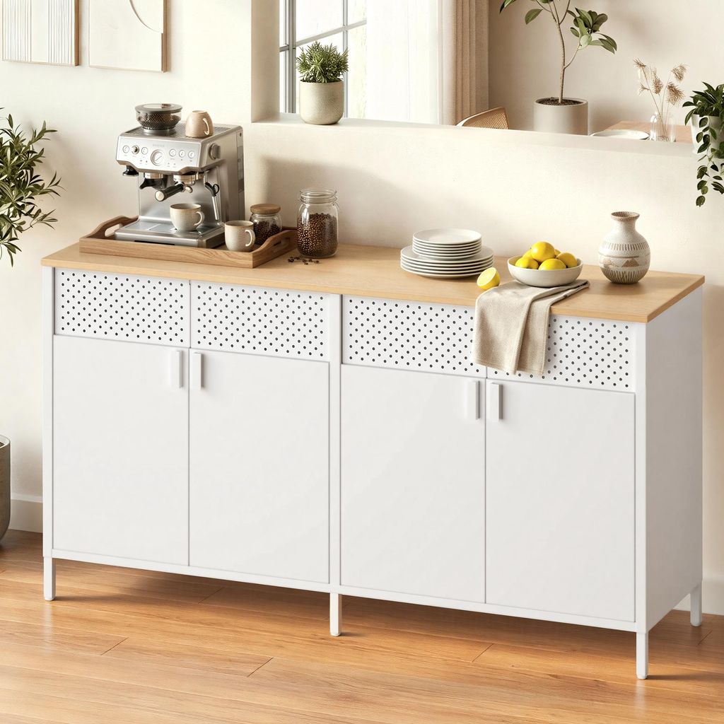 A white and wood cabinet with a coffee machine, dishes, and lemons on top, placed in a room with a window.