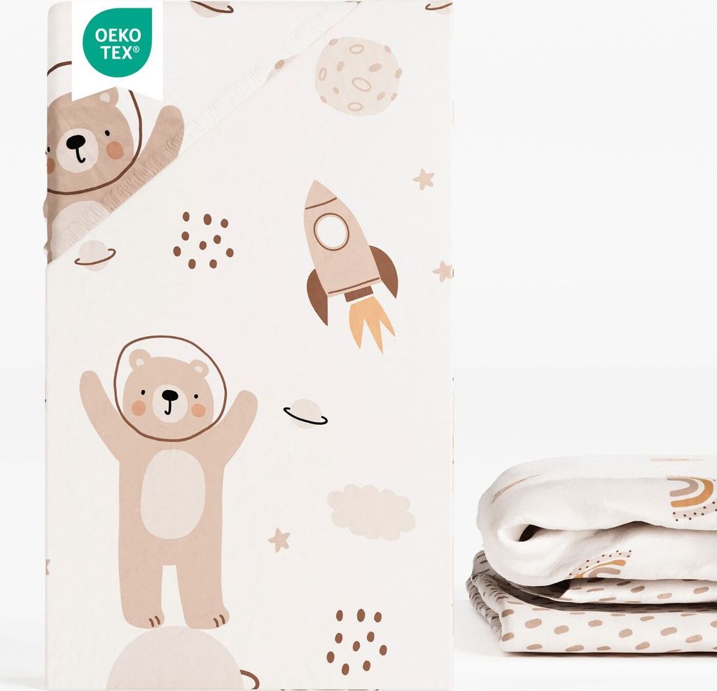 A folded fabric product with a space-themed pattern, featuring bears in astronaut suits and rockets.