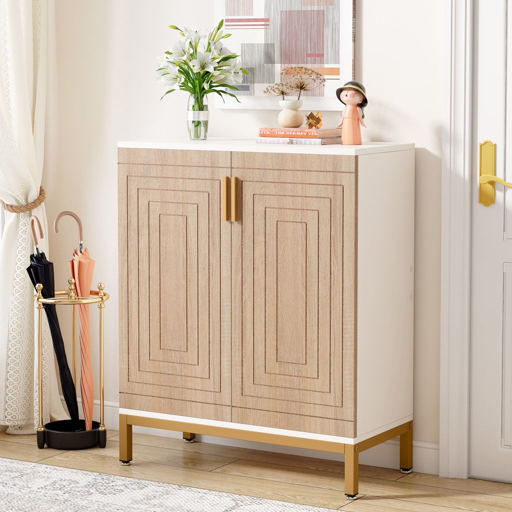 A shoe cabinet with decorative doors and gold handles, placed in an entryway with an umbrella stand and curtains.