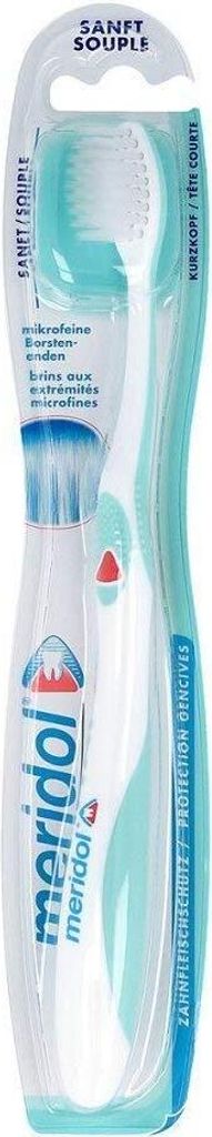 A packaged Meridol toothbrush on a white background.