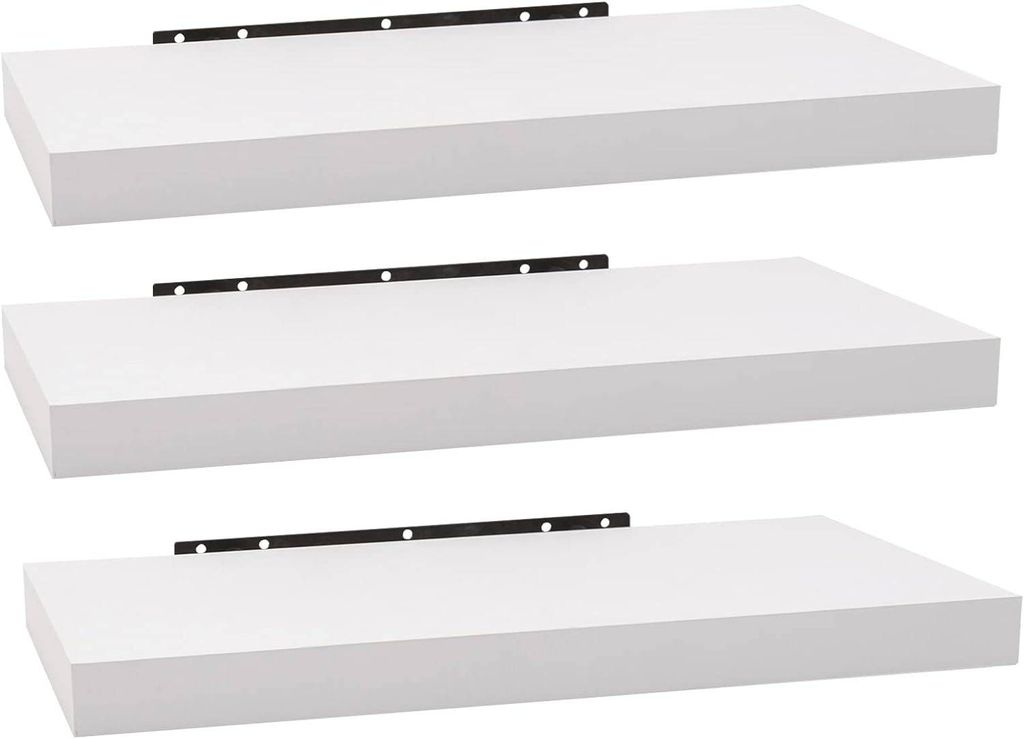 Three white floating shelves are stacked vertically against a white background.