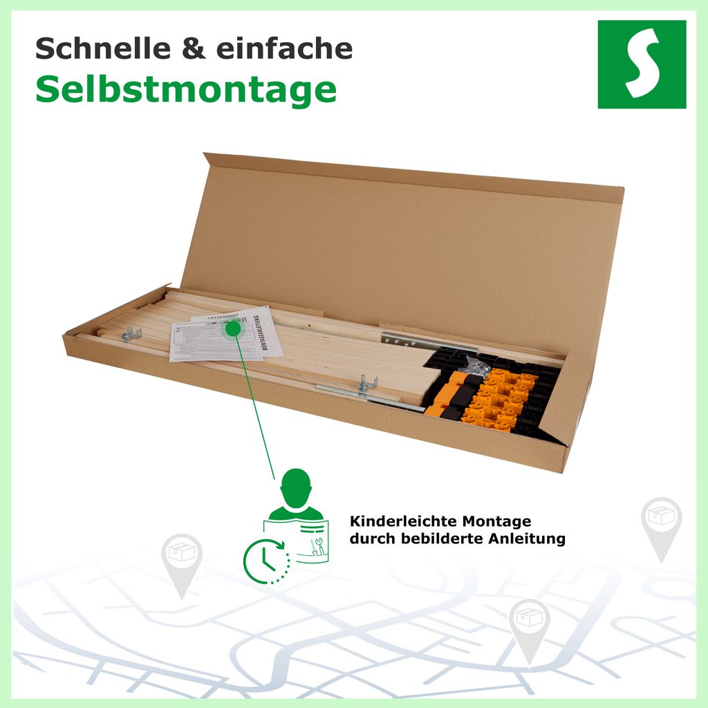 The image shows a cardboard box containing parts of a slatted bed base, along with assembly instructions and some small components.