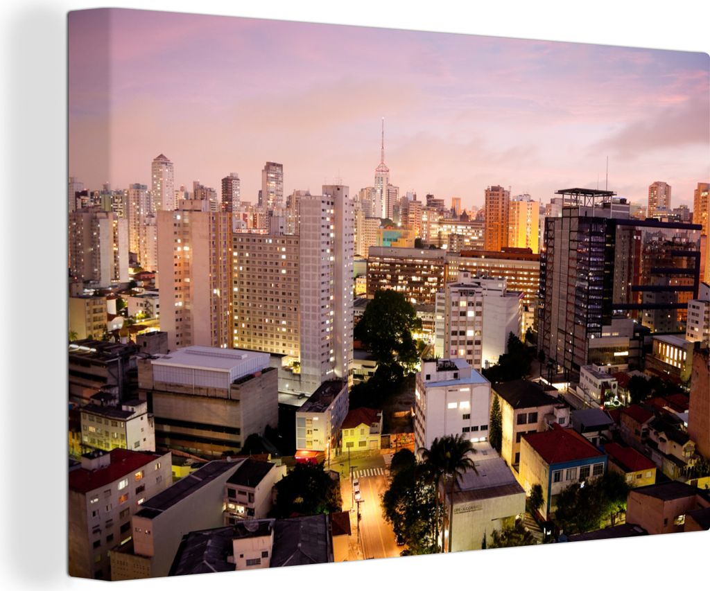 OneMillionCanvasses - Leinwandbilder - 140x90 cm, Eine rosa gefärbte Abenddämmerung fällt über São Paulo in Brasilien, Wandbilder Kunstdruck...