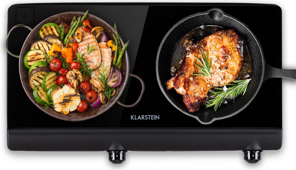A black Klarstein induction cooktop with two cooking zones, each displaying food being cooked.