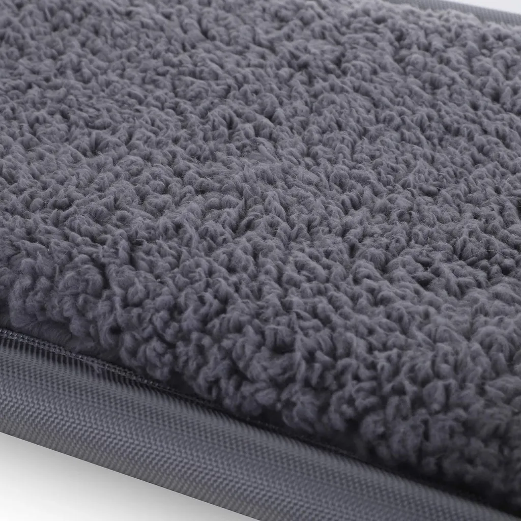Couchage pour chat gris blanc forme de 9 idéal pour petits espaces
