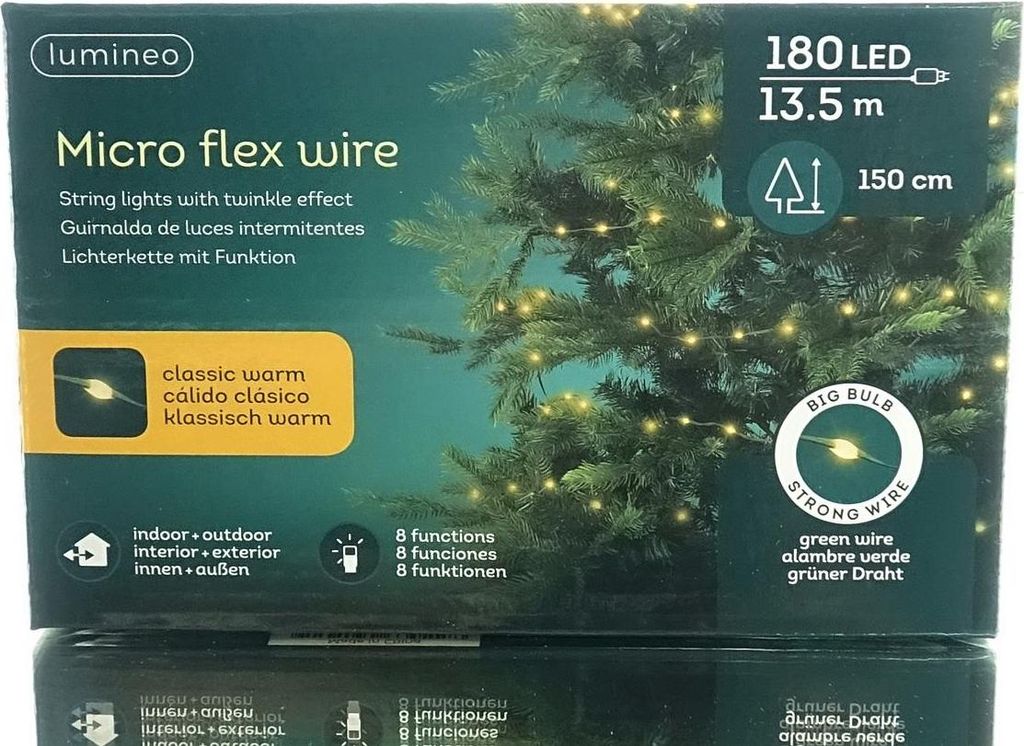 The image shows the packaging of Lumineo Micro flex wire string lights, with a Christmas tree decorated with the lights in the background.