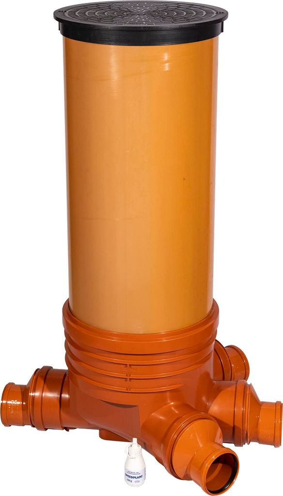 A sewage inspection shaft with multiple inlets and a lid.