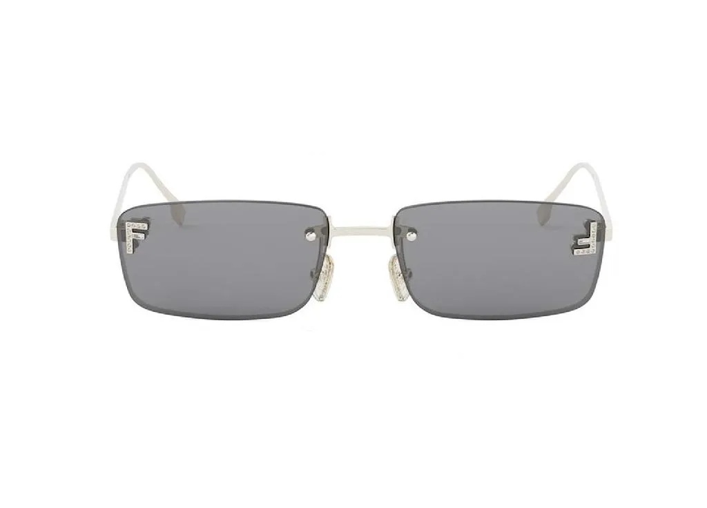 Lunettes Fendi First FE4172US 32A dorées avec cristaux et verres gris