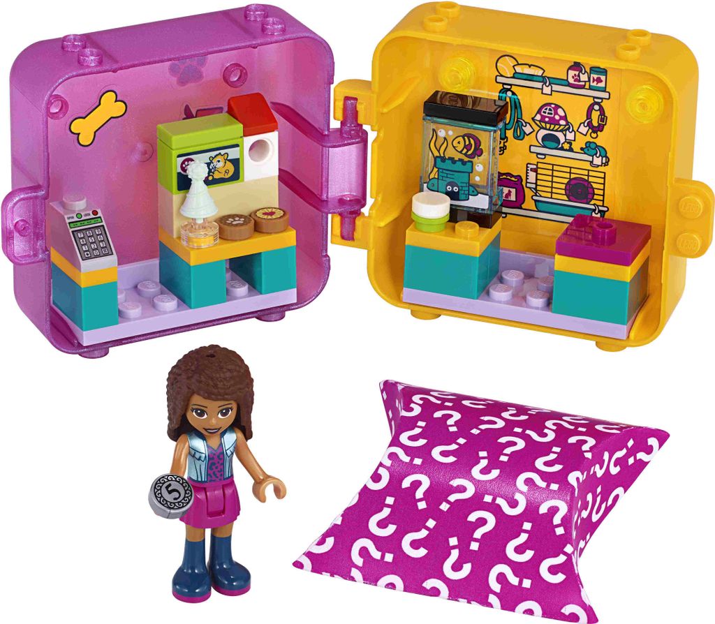 A LEGO Friends Andreas's Pet Shop Magic Cube toy set is displayed with a mini-figure and a mystery accessory bag.