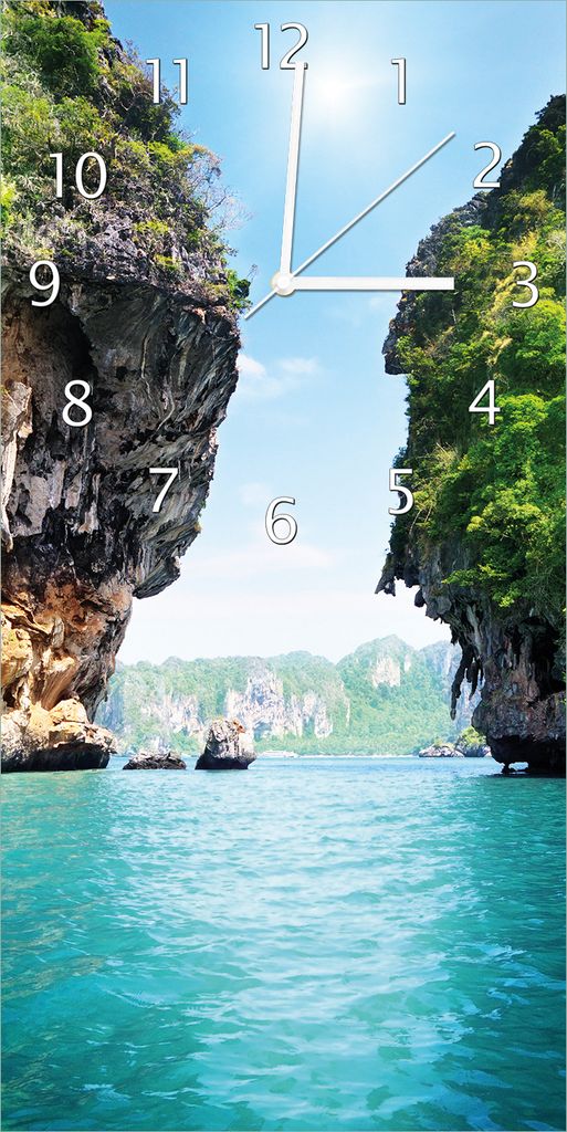 Wallario Design Wanduhr bedruckt, Größe 30 x 60 cm, Motiv: Felsenschlucht am Meer in Thailand