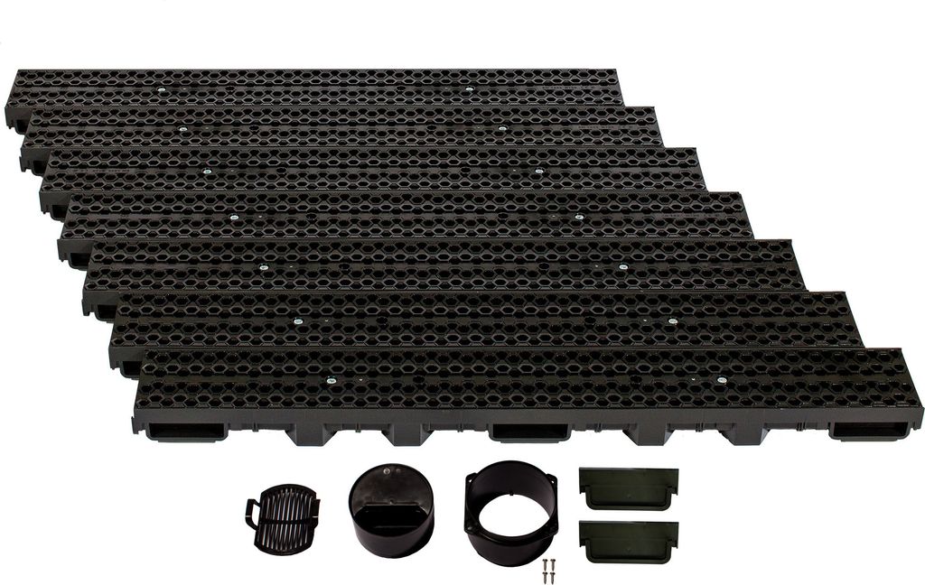 A set of black drainage channels and accessories arranged on a white background.