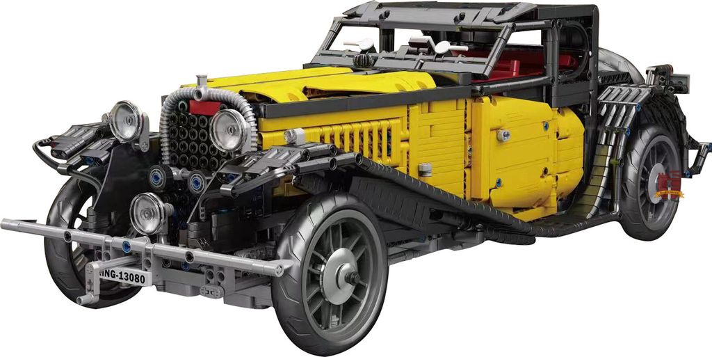 A yellow and black vintage-style car model made of building blocks, shown from a three-quarter front angle against a white background.