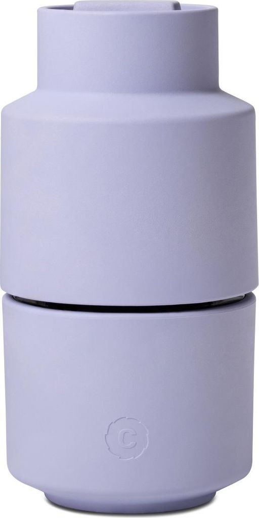 A lavender colored grinder is shown against a white background.