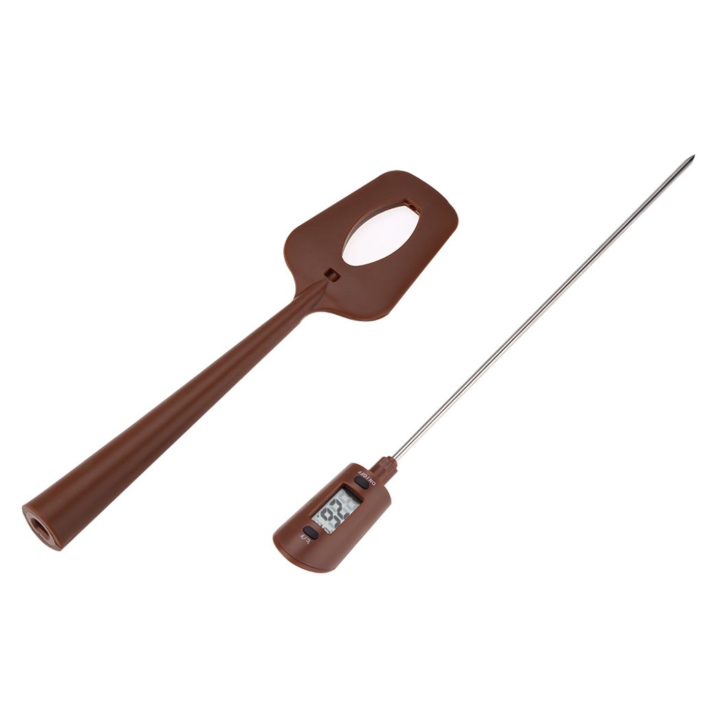 A brown spatula and a silver digital thermometer are shown against a white background.