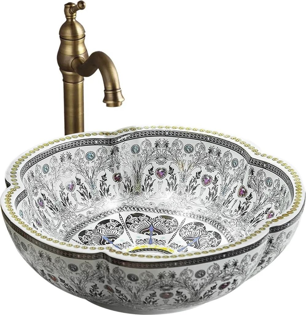 A decorative ceramic sink with a faucet.