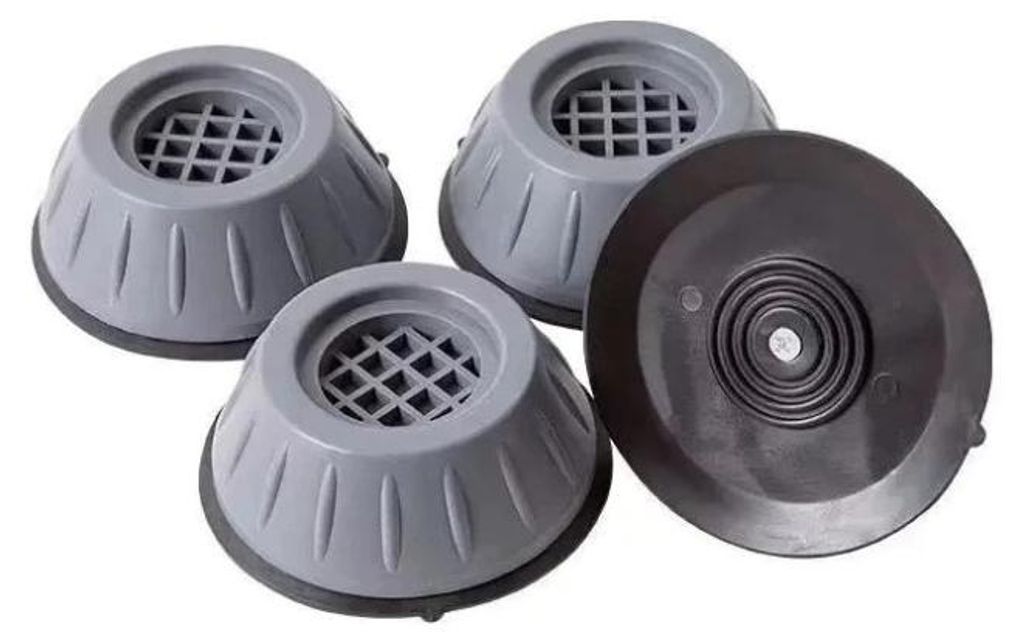 Four anti-vibration pads for washing machines or dryers, with one pad shown from a different angle.