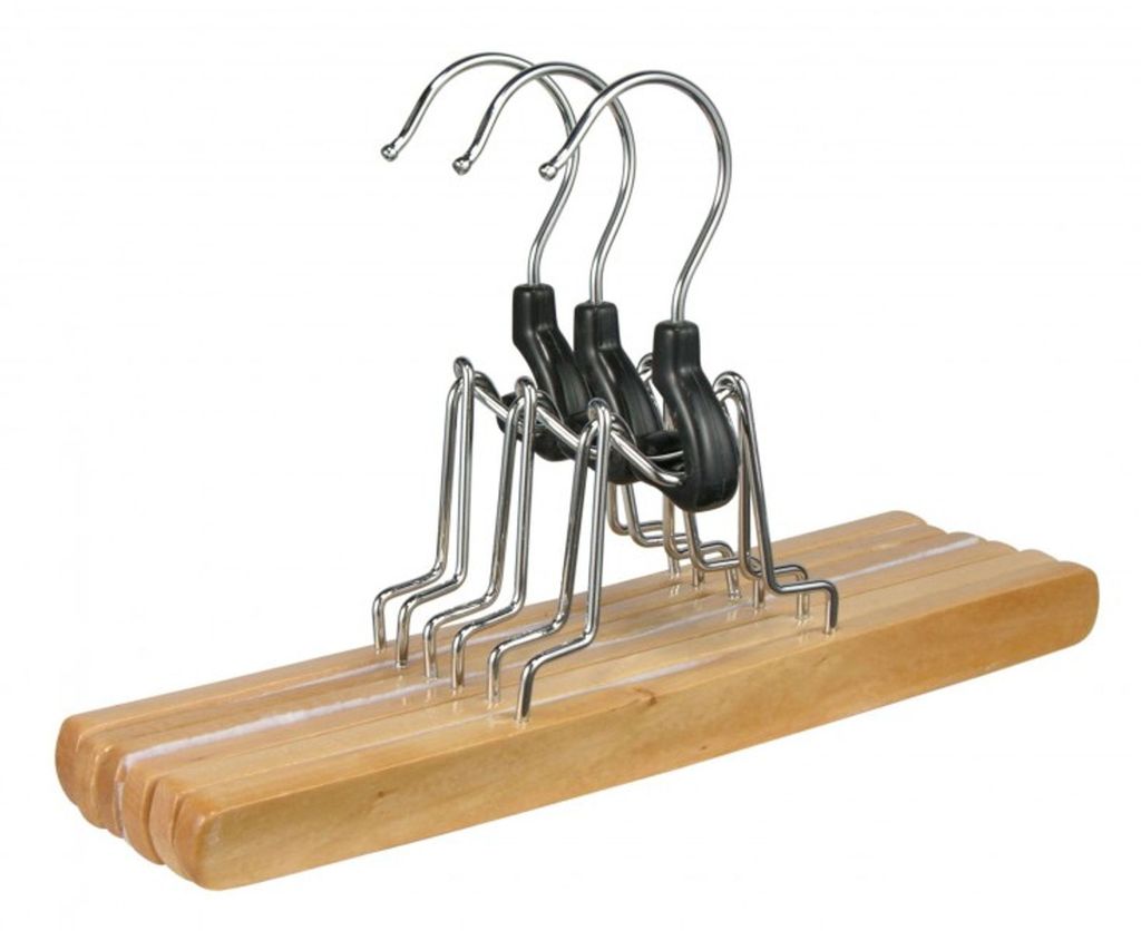 A set of three wooden hangers with silver clips and black plastic grips against a white background.