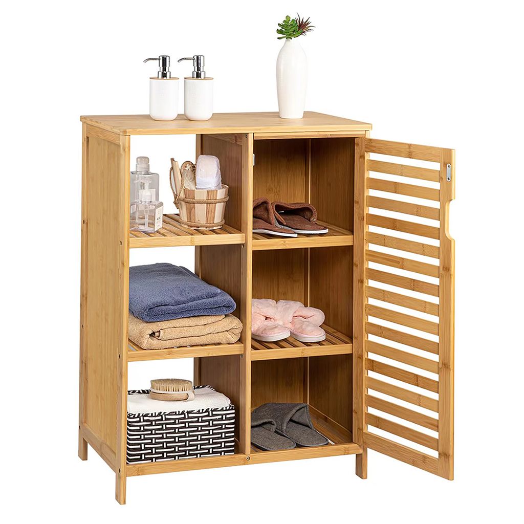 A bamboo bathroom cabinet with an open door, displaying toiletries, towels, and slippers on its shelves.
