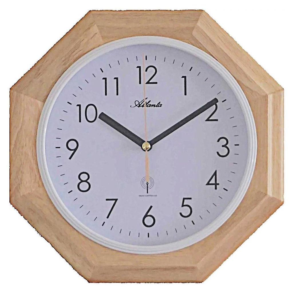 A wall clock with a wooden frame.