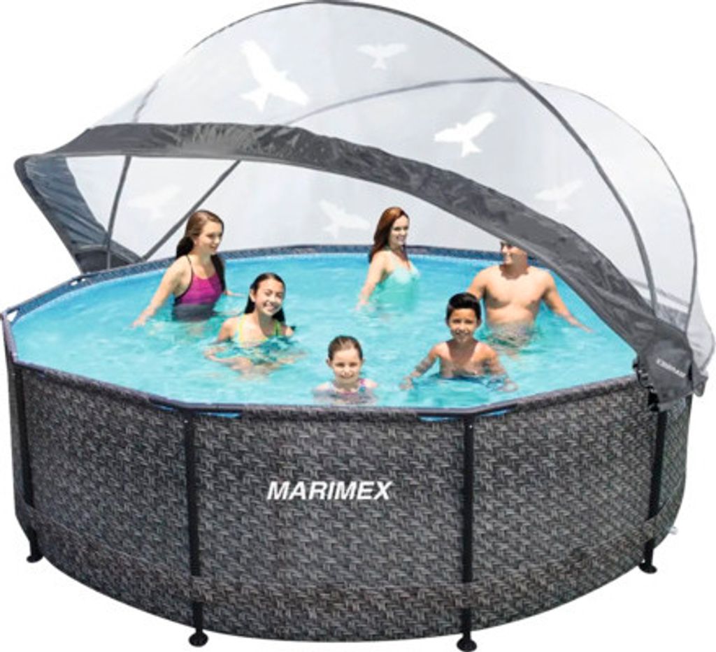 A family is enjoying a swim in an above-ground pool on a sunny day.