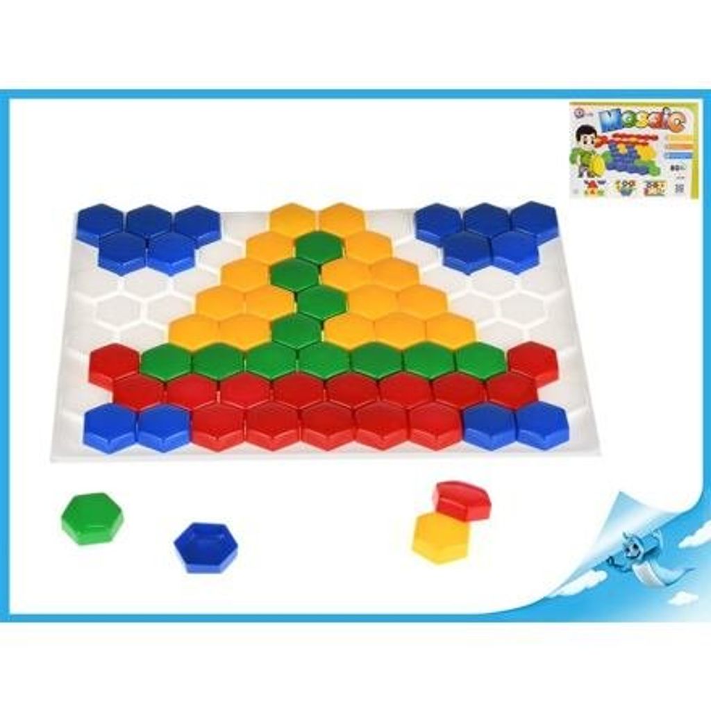A mosaic toy set with hexagonal pieces arranged in a triangular pattern on a white board. Loose pieces are scattered around the board.