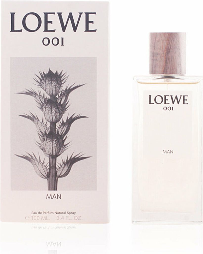 A perfume bottle and its packaging are displayed side-by-side against a white background.