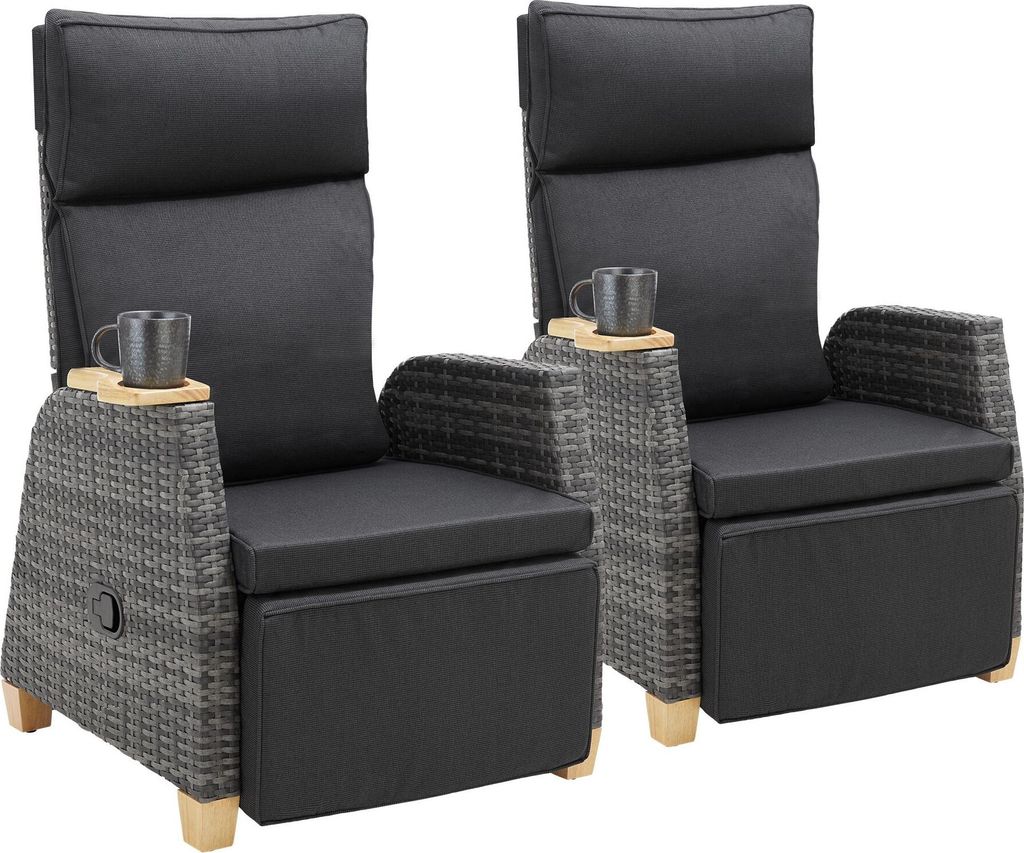 Two outdoor recliners with cup holders.