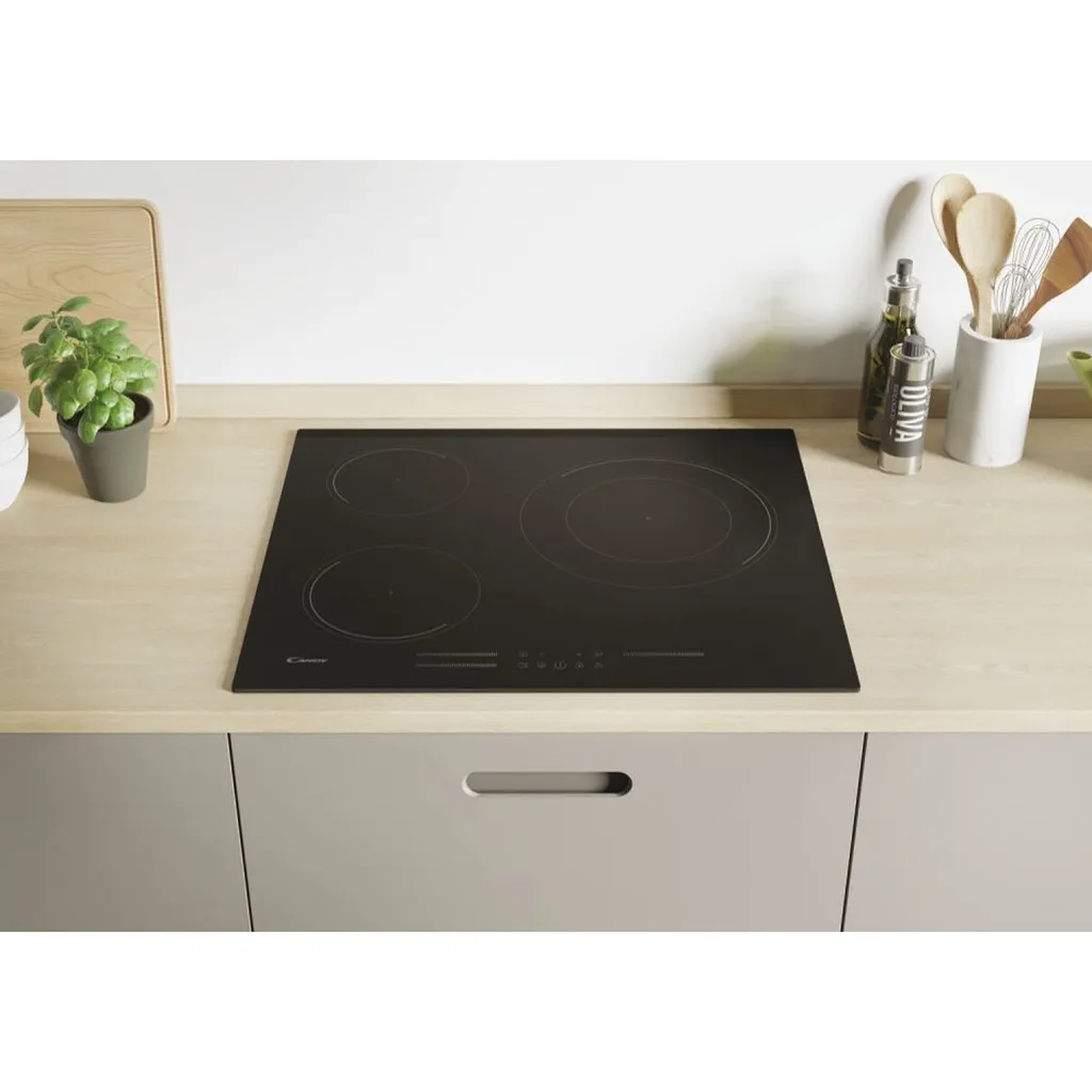Table induction Candy CI633MCBB 7200 W à commandes tactiles - Noir 60cm - 2