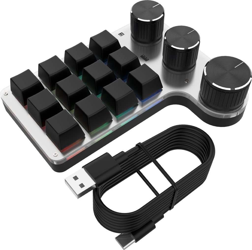 A close-up studio shot of a black and silver gaming keypad with three rotary knobs and a USB-C cable.