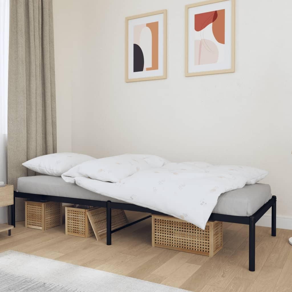 A bedroom scene with a bed frame, mattress, bedding, and storage baskets.