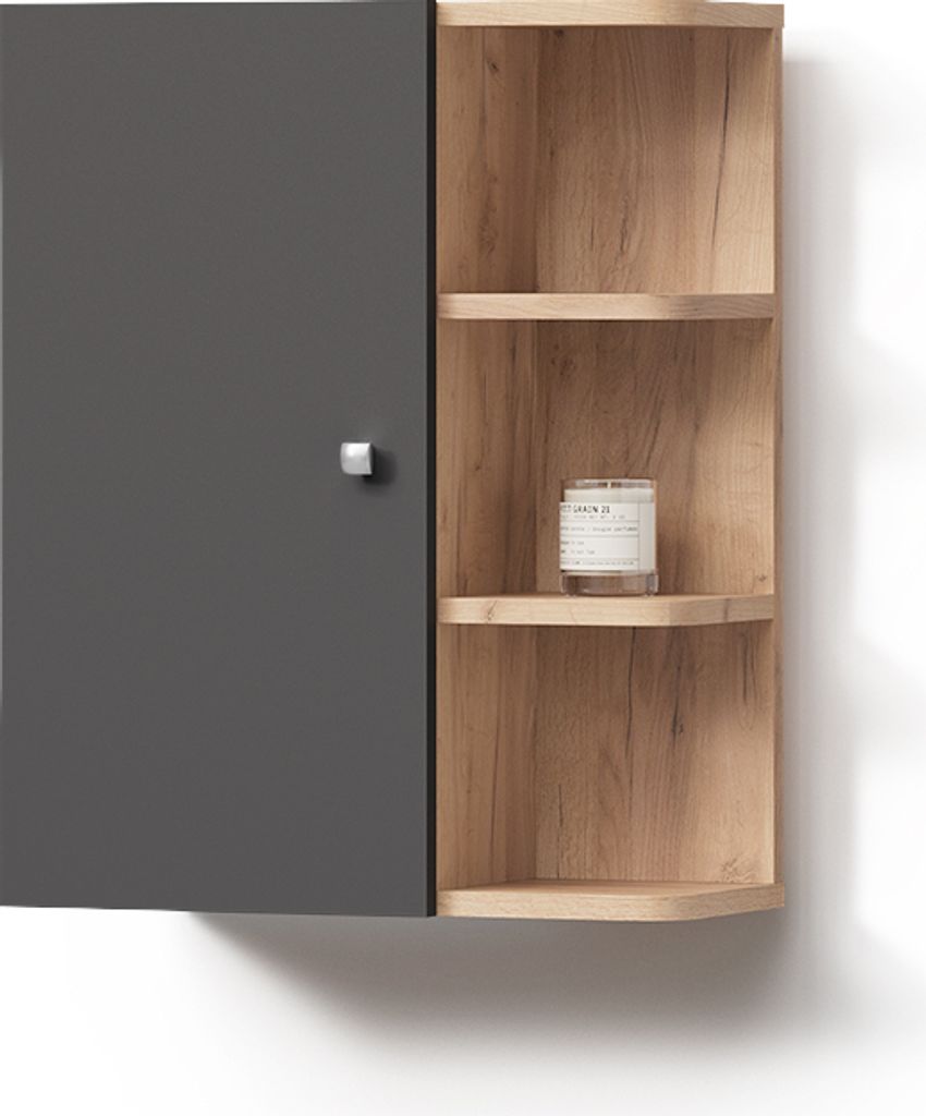 A corner cabinet with a closed door on the left and open shelves on the right, displaying a candle.